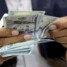 تحذيرات اقتصادية من آثار رفع الدولار الجمركي